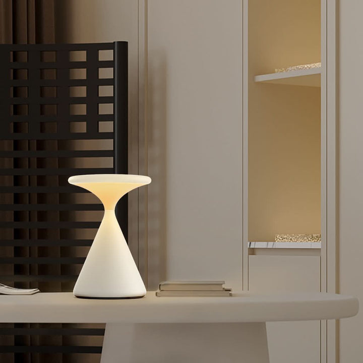 Cordless LED lamp on restaurant table creating ambient atmosphere