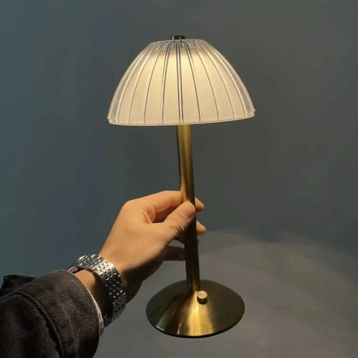 Crystal cordless lamp style C with cylindrical acrylic shade on dining table