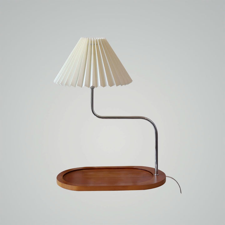 Green fabric shade pleated lamp on office desk