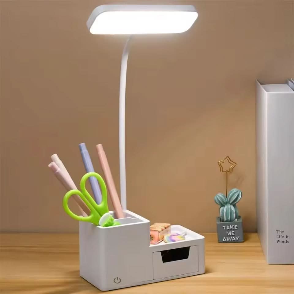 Foldable LED desk lamp in white with touch control panel and adjustable arm